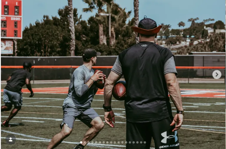 Todd Durkin running on-field throwing work with Drew Brees