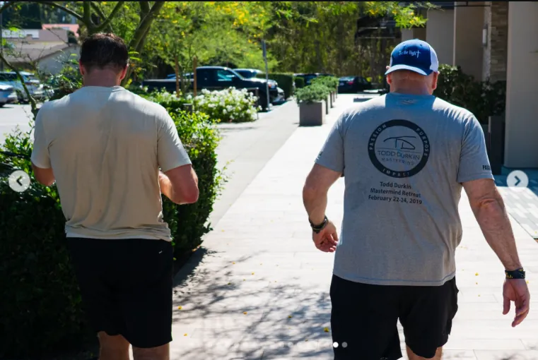 Todd Durkin and Drew Brees walking after a session